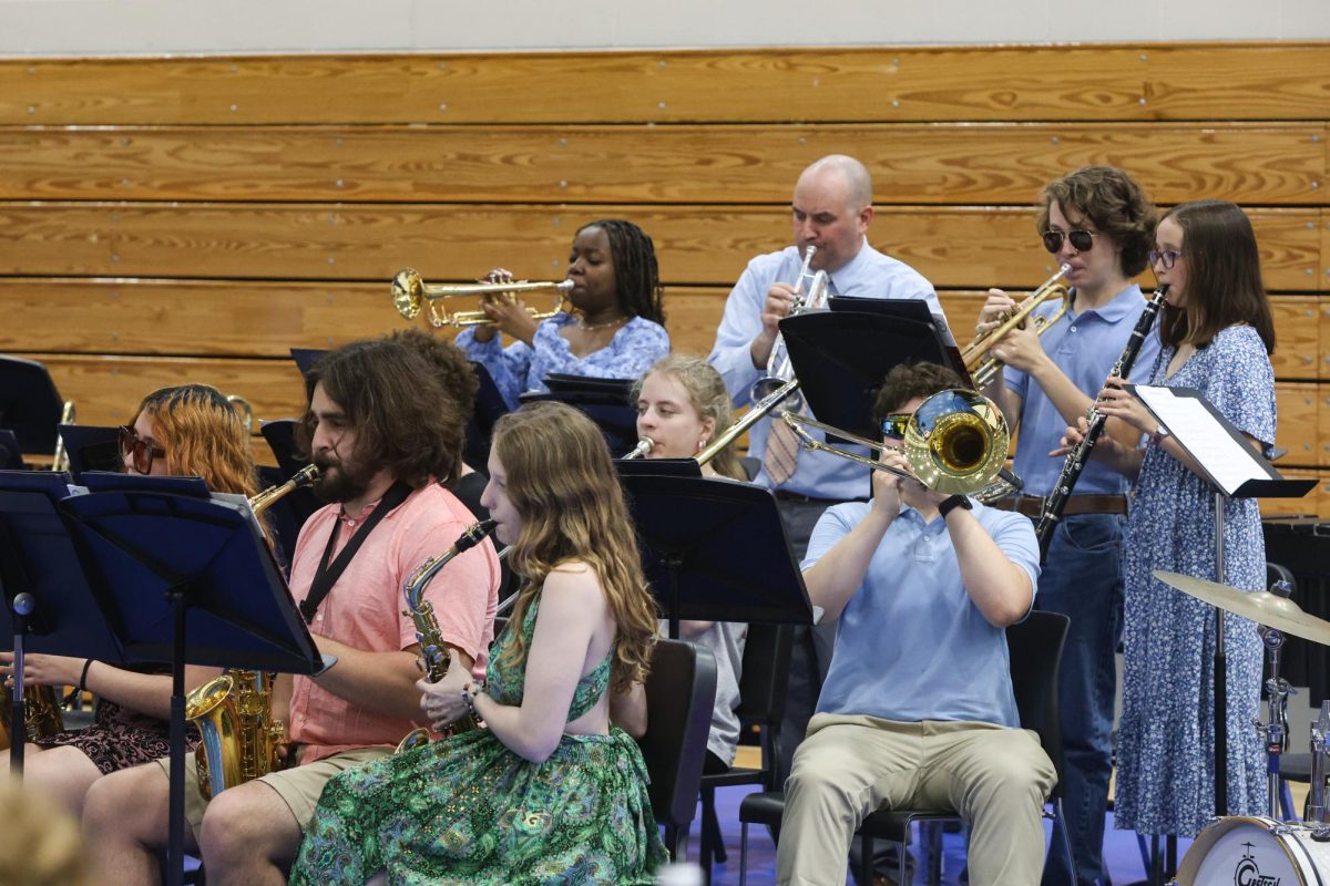 Band teacher, Mr. Holesovsky, performing with his students at the Pops Concert.