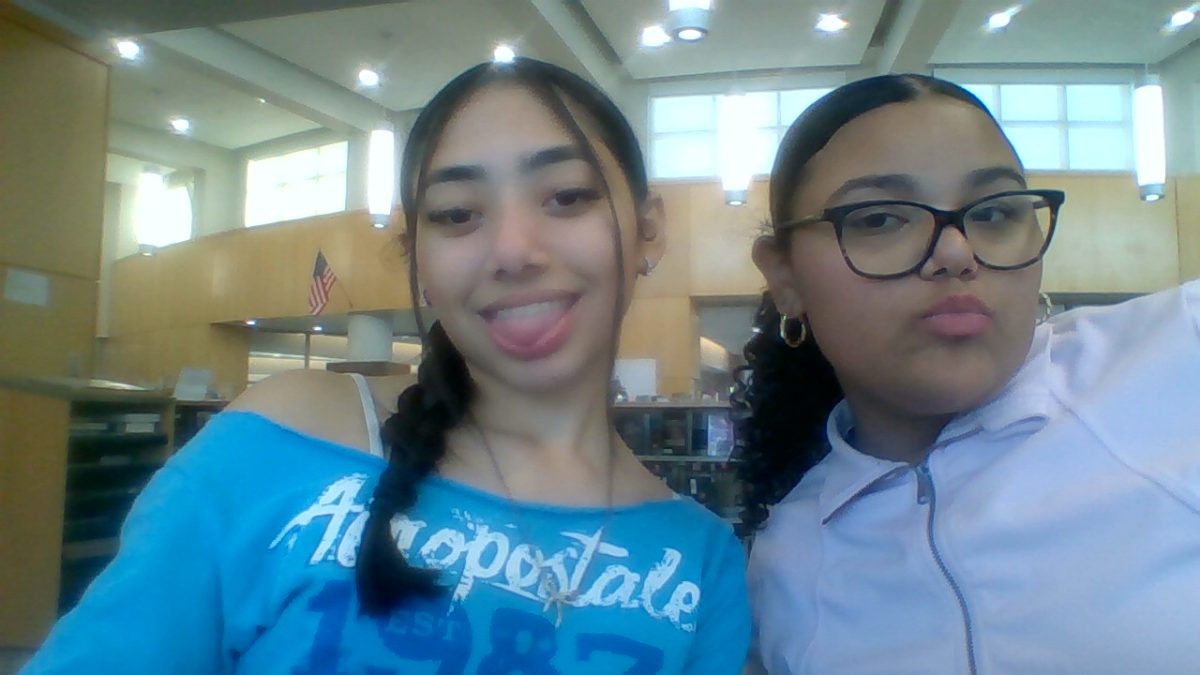 Natalee Gonzalez with her best friend in the library attending STEAM after school.